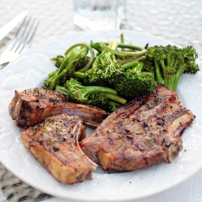 grilled goat chops with roasted broccoli and garlic scapes